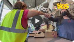 Women shaking hands. NBC.