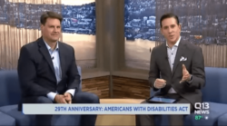 Two men sitting in a studio. 29th anniversary: Americans with Disabilities Act on Q13 News.